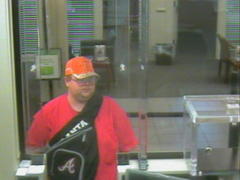 Bank Robber Strikes; Former Cop May Have Falsified Records